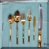 S01a. 77-Piece Tiffany & Co set of sterling silver and gold vermeil bamboo flatware (12 - 5 piece place settings) 12 dinner knives, 12 dinner forks, 12 lunch forks, 12 tablespoons, 12 teaspoons, 7 butter knives, 2 demitasse spoons 1 large serving spoon and 6 napkin rings - $12000 